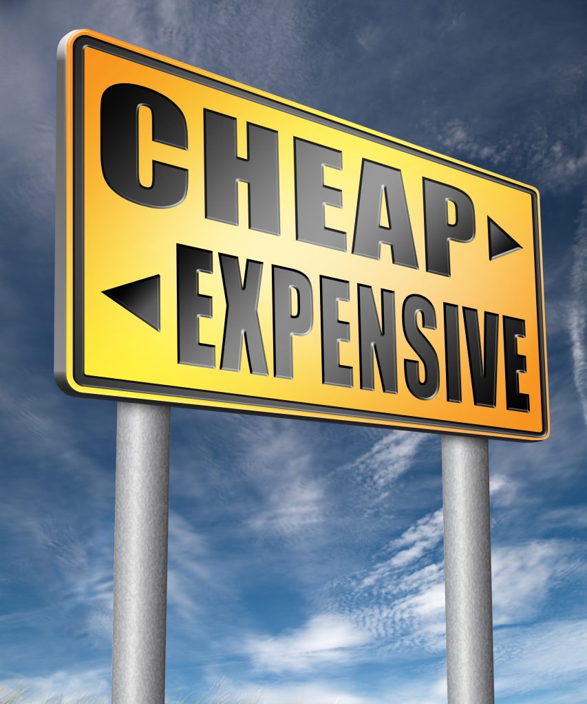 Applicable to Promotional Spend Optimization: Image shows a road sign on yellow background with black letters that reads "Cheap" with an arrow to the right, and "Expensive" with an arrow to the left underneath.
